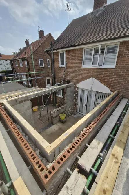 Brick and block walls of a house extension built to joist level by G&M Building Solutions in Leeds