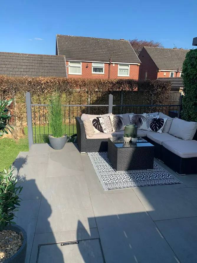 Porcelain patio with garden seating area built by G&M Building Solutions in Leeds
