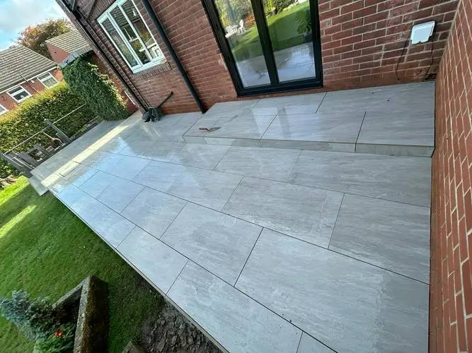 Porcelain paving laid across a rear garden by G&M Building Solutions in Leeds